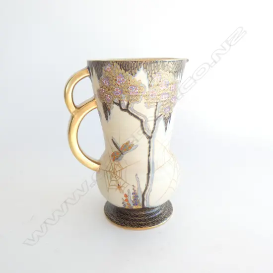 A Crown Devon jug, M192 Spiders Web & Dragonfly pattern